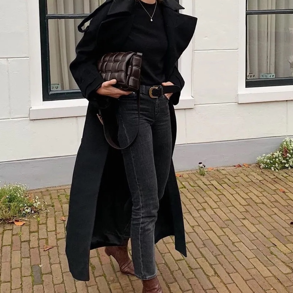 Cropped washed out black jeans with raw hem